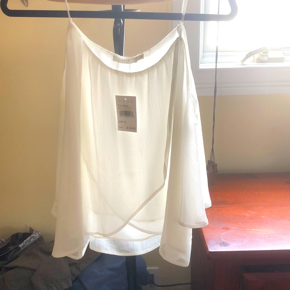 Lush BNWT cold shoulder top with spaghetti straps. Size medium.